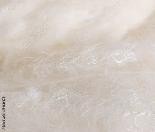 white thin natural threads of silk as a background