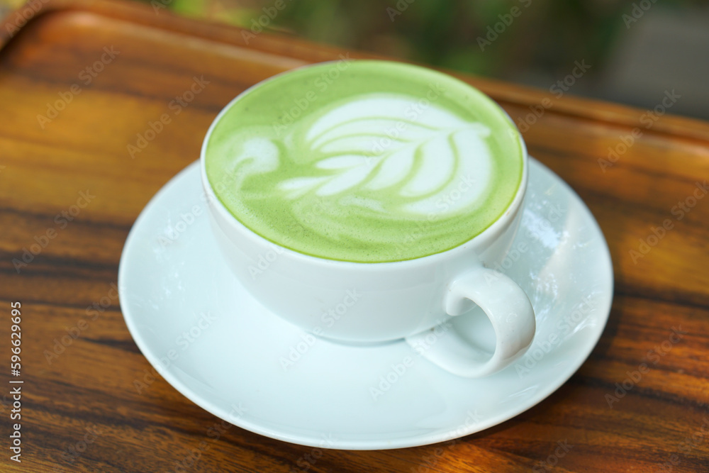 Hot green tea. Flower bubbles in a glass. Hot green tea. Flower bubbles in a glass.