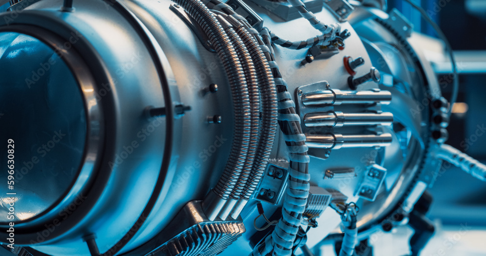 Fototapeta premium Advanced Futuristic Turbine Engine with Multiple Fans, Wires, Connectors. Jet Engine with Stylish Contemporary Design in Technological Silver Color. Project in Development in Research Laboratory