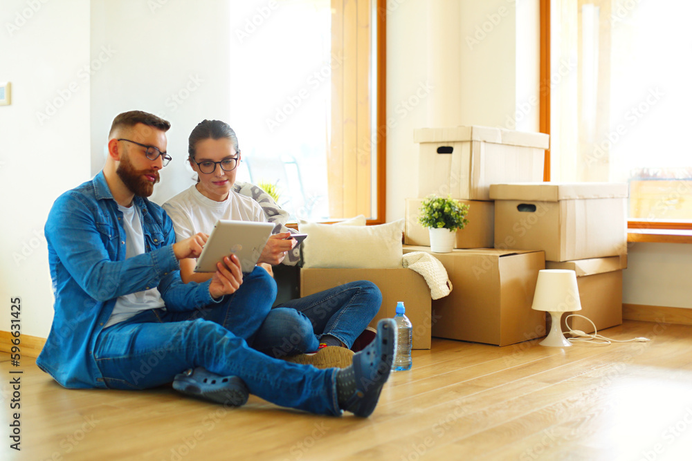 Portrait of happy couple in new home. Portrait of happy couple in new home.