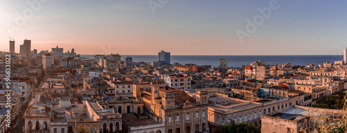 View over the rooftops of Havana in Cuba at sunset with the El National hotel