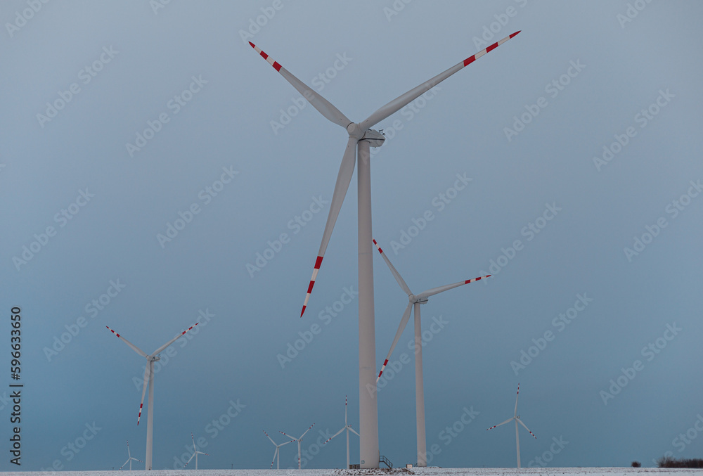 windmills against the cloudy sky windmills against the cloudy sky
