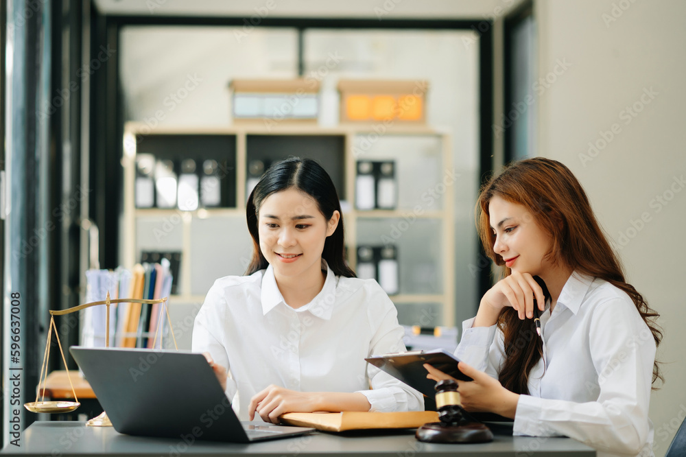Business and Female lawyer or judge consult having team meeting with client, Law and Legal services concept.Customer service good cooperation in office. Business and Female lawyer or judge consult having team meeting with client, Law and Legal services concept.Customer service good cooperation in office.