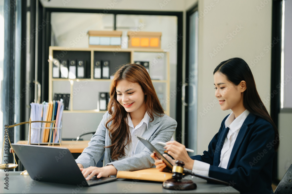 business Asian people and lawyers discussing contract papers sitting at the table. Concepts of law, advice, legal services. business Asian people and lawyers discussing contract papers sitting at the table. Concepts of law, advice, legal services.