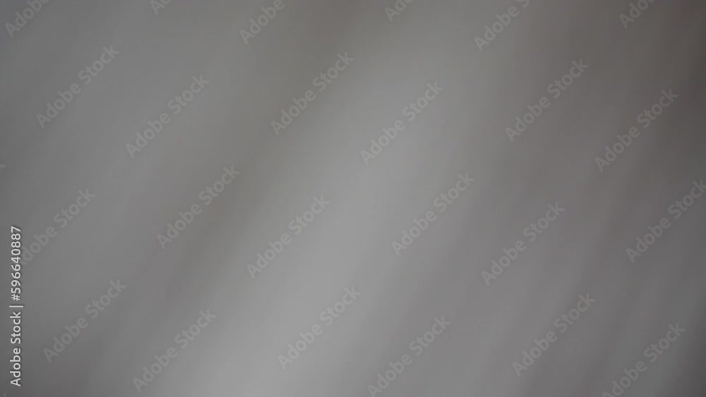 Moving light projection on white wall background, abstract parallel gradient line pattern of sun ray alternate with shadow, stream of beam shining in a gloomy room.