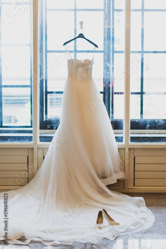 wedding dress on a hanger