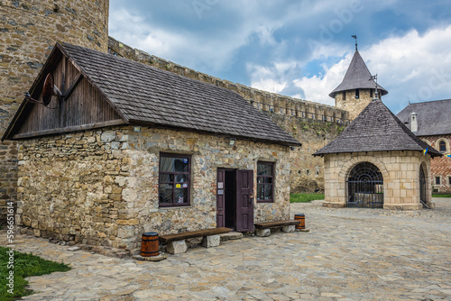 Souvenir shop and well in Khotyn Fortress, fortification complex in Khotyn, Ukraine photo