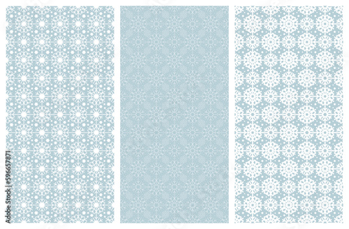 Set of rectangular Christmas seamless patterns. White snowflakes, stars on cold gray-blue winter background. Vector template for fabrics, textiles, wallpaper design, interiors, wrapping paper, pillows