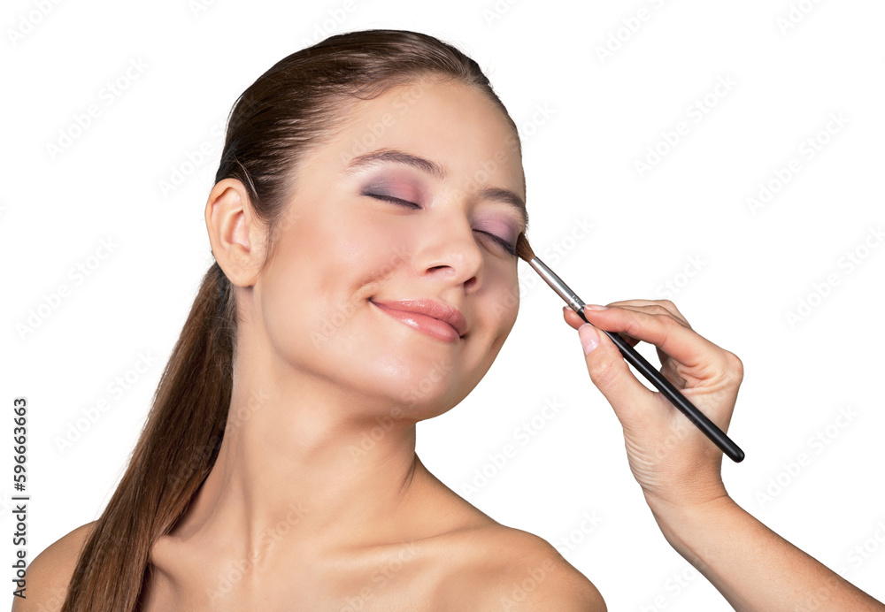 Fototapeta premium Professional makeup artist doing makeup for girl
