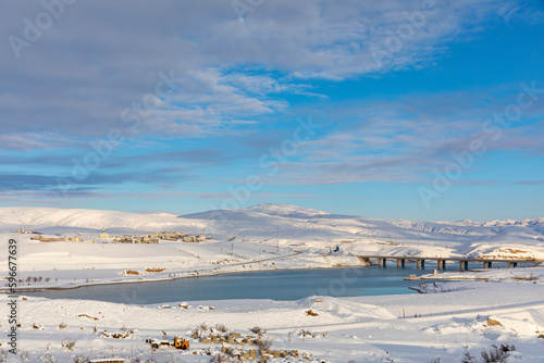 Fototapeta Naklejka Na Ścianę i Meble -  Erzincan Province, İliç District with snowy landscapes, river and historical bridge