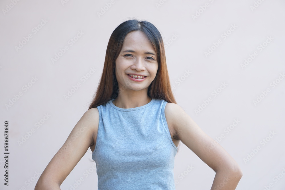 Asian woman smiling happily braces Asian woman smiling happily braces