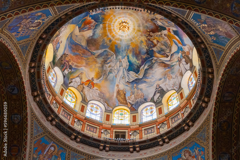 The Szeged Votive Church, a place of Christian worship and spirituality, is adorned with stunning frescos and mural paintings that reflect its faith-based architecture.	