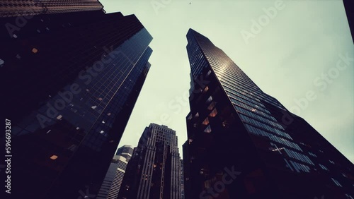 View looking up at high rise buildings photo