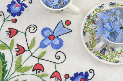 Cuadro en lienzo Traditional polish, kashubioan tablecloth and pattern on a cup.
