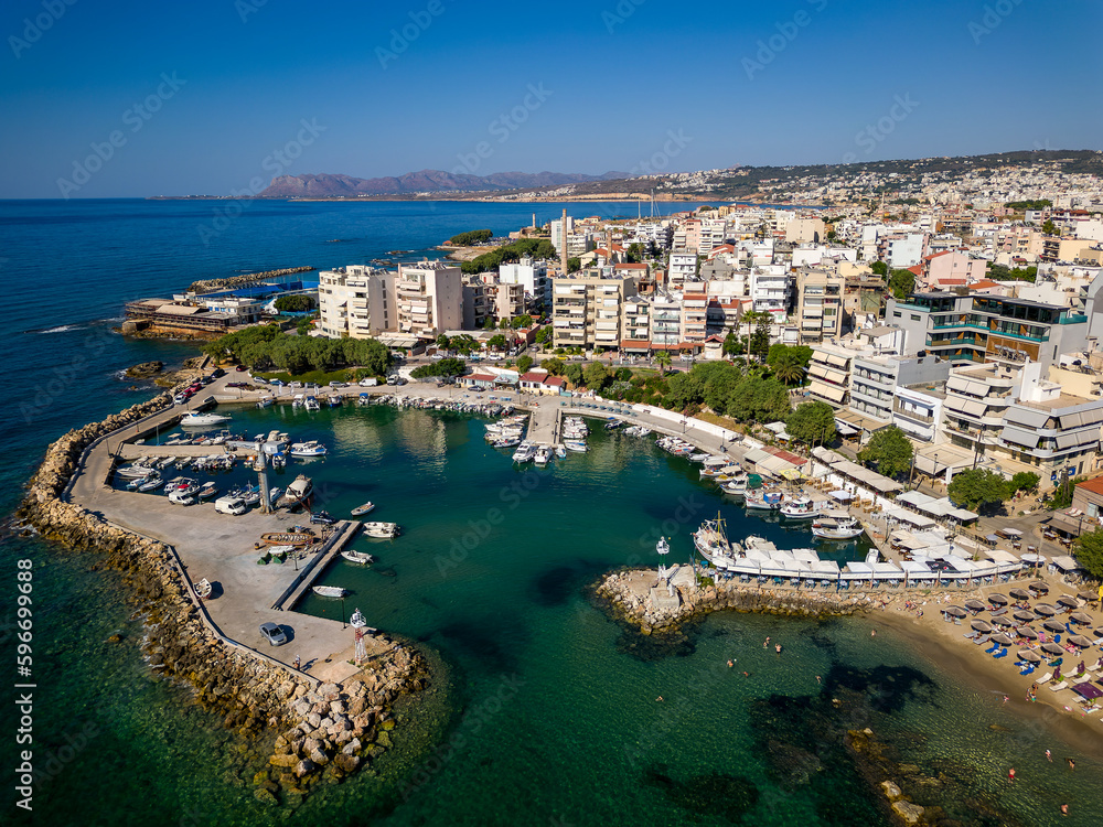 Aerial view of the beach and marine of Nea Chora in the Cretan city of Chania, Greece