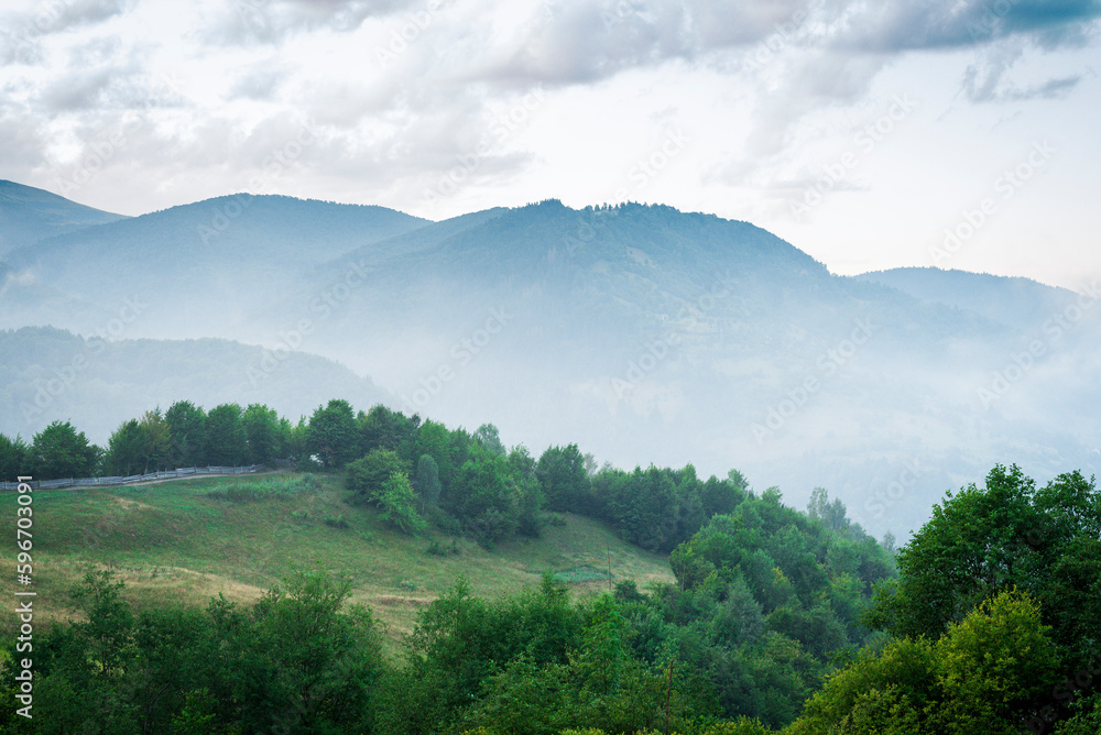 Atmospheric background on the tops of mountains and green forests of the Carpathians in Ukraine Atmospheric background on the tops of mountains and green forests of the Carpathians in Ukraine
