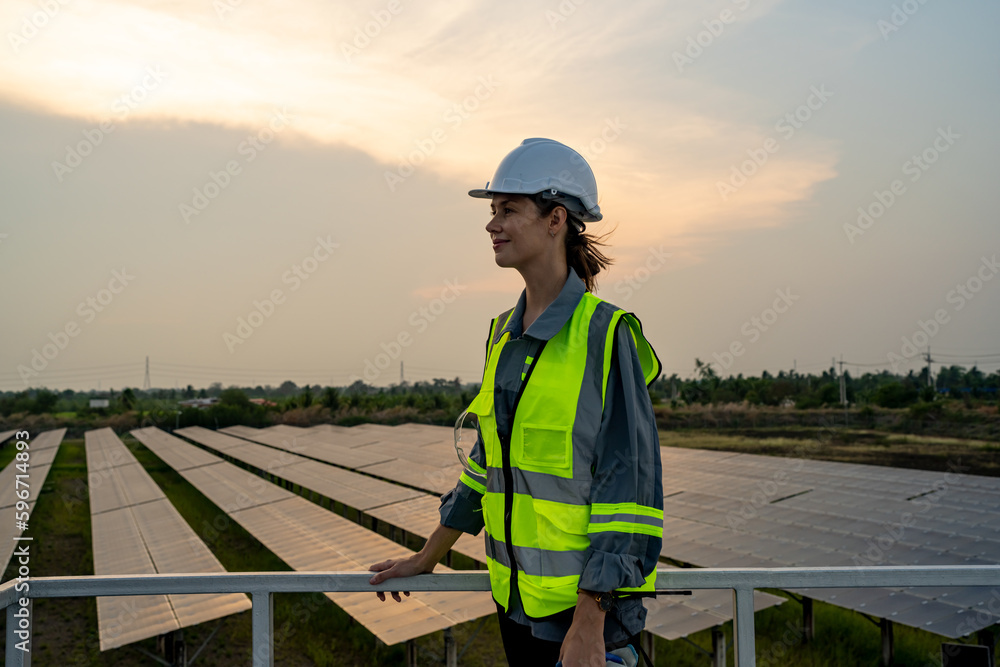 Engineer hand is installing and checking an operation of sun and cleanliness of photovoltaic solar panels, Engineer with energy measurement tool photovoltaic modules for renewable energy Engineer hand is installing and checking an operation of sun and cleanliness of photovoltaic solar panels, Engineer with energy measurement tool photovoltaic modules for renewable energy