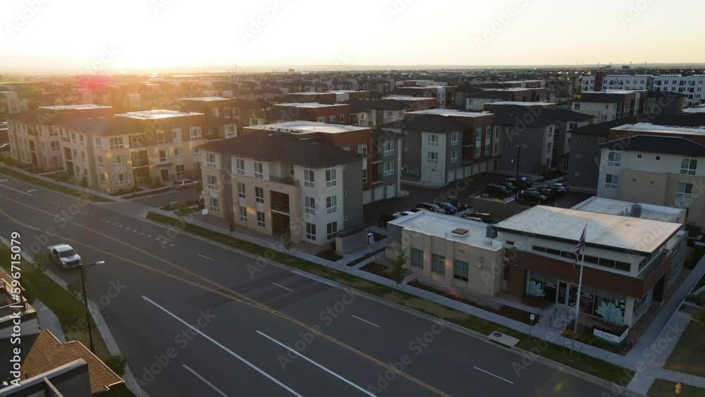 4K Aerial/Drone Rise over Residential Apartments and Neighborhood at Sunset 4K Aerial/Drone Rise over Residential Apartments and Neighborhood at Sunset