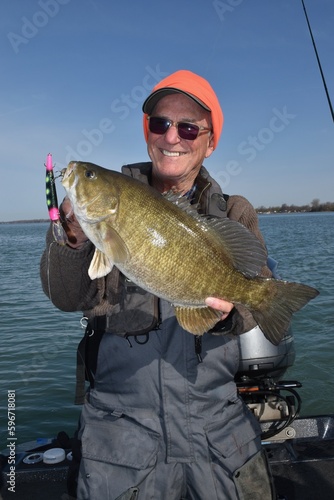 Angler with a bass