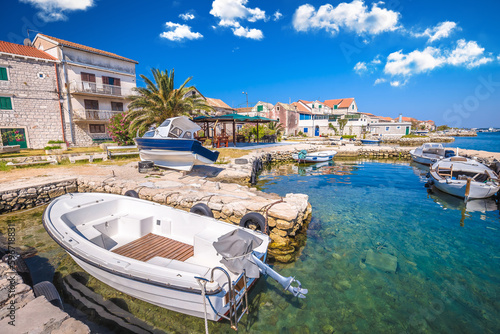 Fishermen village waterfront on Krapanj island view,  sea sponge harvesting village photo