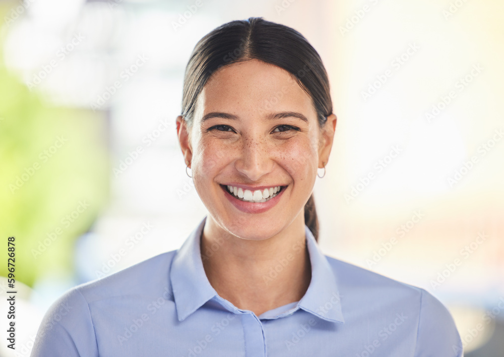 Closeup portrait of a happy mixed race smiling female working. Face shot of a cheerful positive hispanic woman enjoying her corporate office job while wearing formal clothes and showing her teeth Closeup portrait of a happy mixed race smiling female working. Face shot of a cheerful positive hispanic woman enjoying her corporate office job while wearing formal clothes and showing her teeth