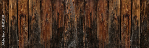 Dark wooden texture. Long wood planks texture background.Wood background and banner. Floor background. Old rustic dark grunge wooden texture.