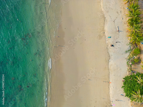 Aerial view white sand beach palm tree turquoise water