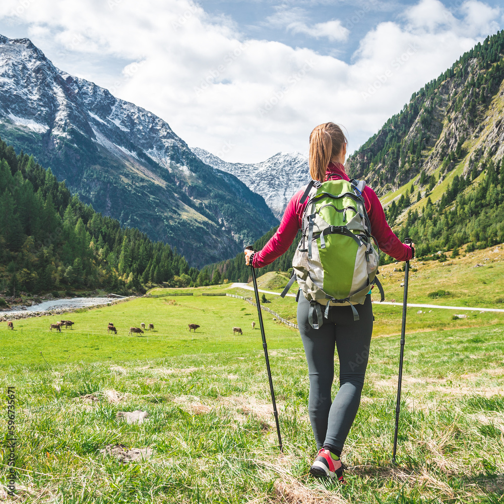 Young woman hiking in the mountains