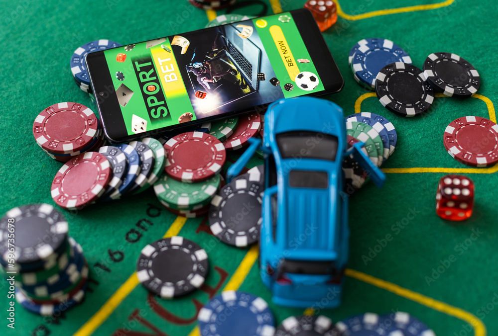 Betting on a smartphone on the background of the casino. Bets, sports betting, bookmaker. Betting on a smartphone on the background of the casino. Bets, sports betting, bookmaker.