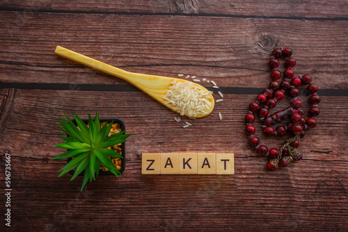 Conceptual zakat (islamic tax). Obligation to aid the poors. Islamic zakat concept. Selective focus.