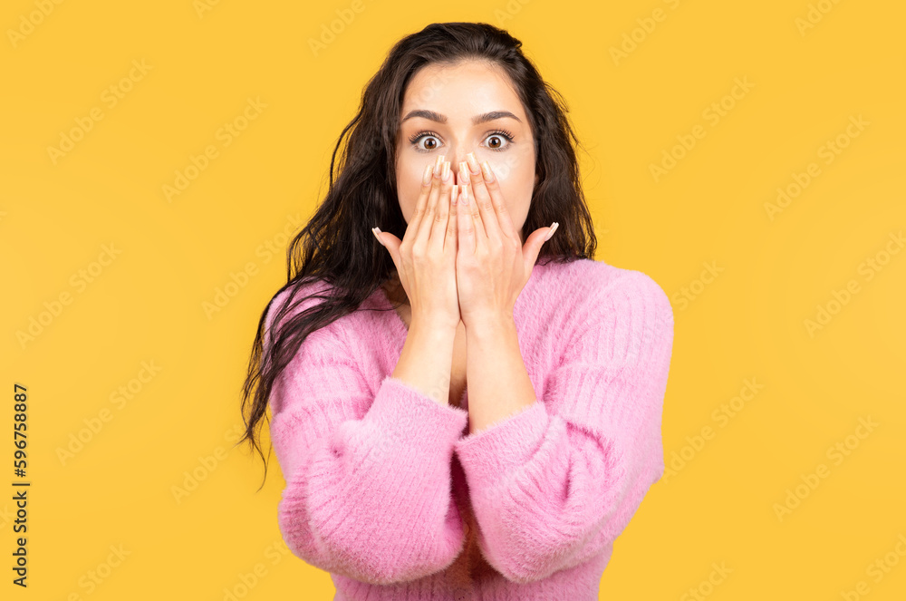 Shocked scared happy millennial arab lady in casual, covering mouth with hands Shocked scared happy millennial arab lady in casual, covering mouth with hands