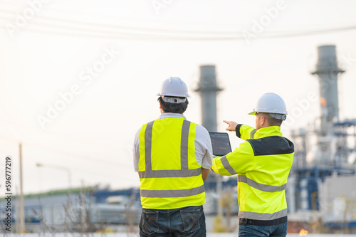 Group Asian man petrochemical engineer working at oil and gas refinery plant industry factory,The people worker man engineer work control at power plant energy industry manufacturing