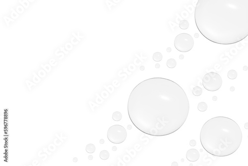 Drops of transparent gel or water in different sizes. On a white background.