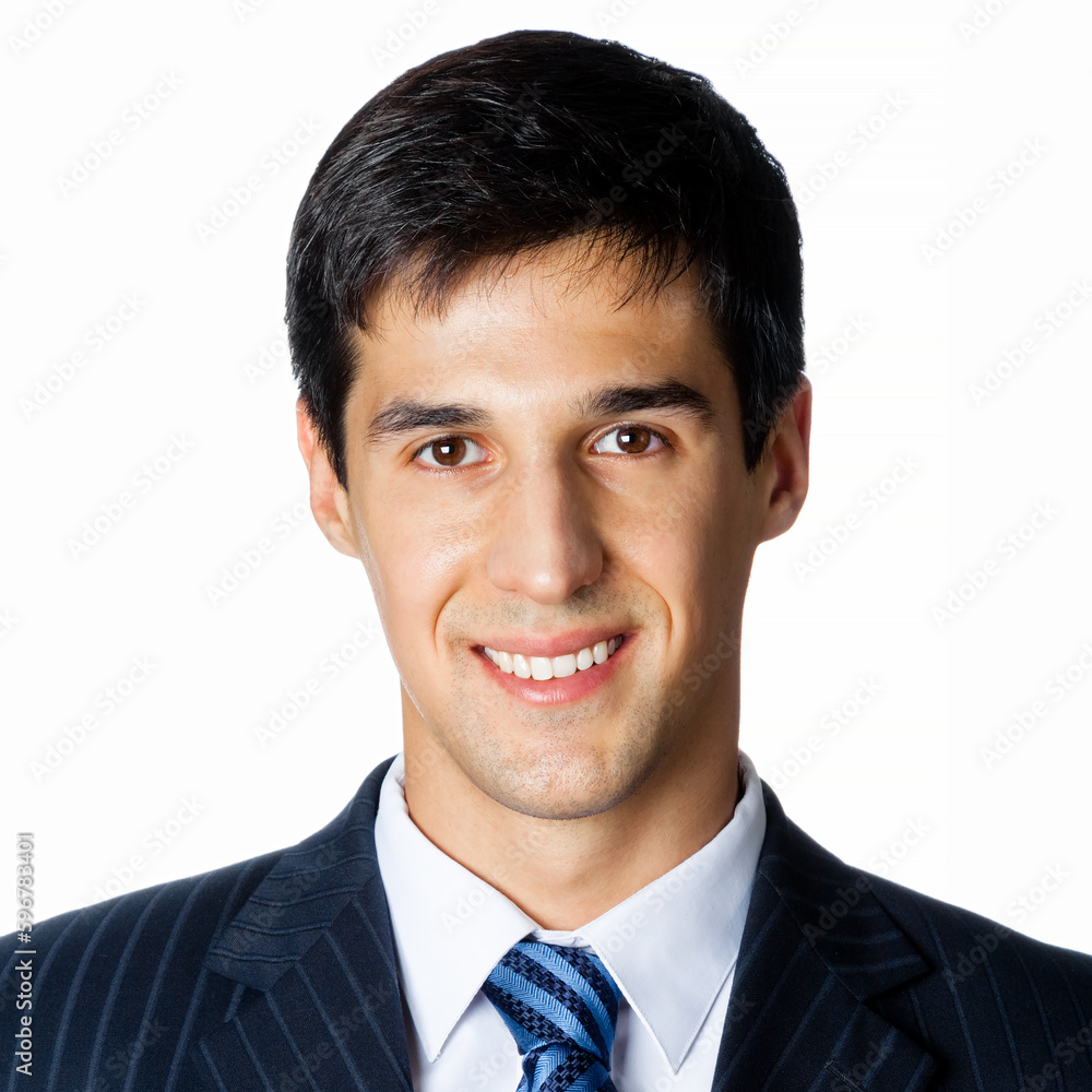 Face portrait of happy smiling young brunette businessman in black confident suit, blue tie necktie, isolated white background, square composition. Office executive employee, manager. Square. Face portrait of happy smiling young brunette businessman in black confident suit, blue tie necktie, isolated white background, square composition. Office executive employee, manager. Square.