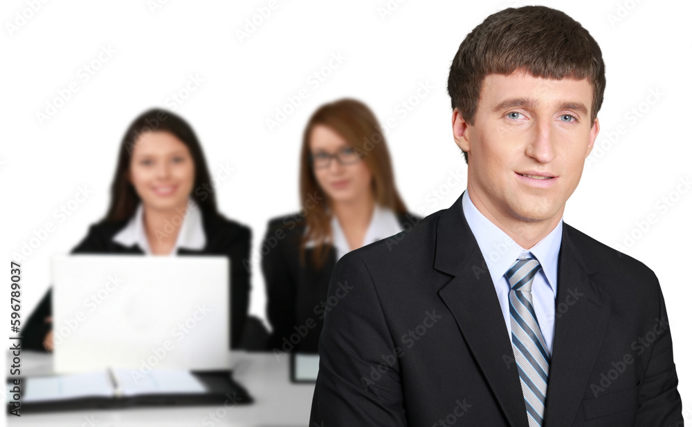 Young businessman and women working together in office isolated on white background Young businessman and women working together in office isolated on white background