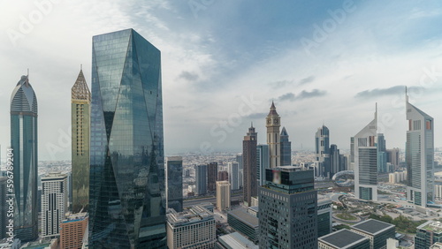 Panorama of futuristic skyscrapers in financial district business center in Dubai on Sheikh Zayed road timelapse