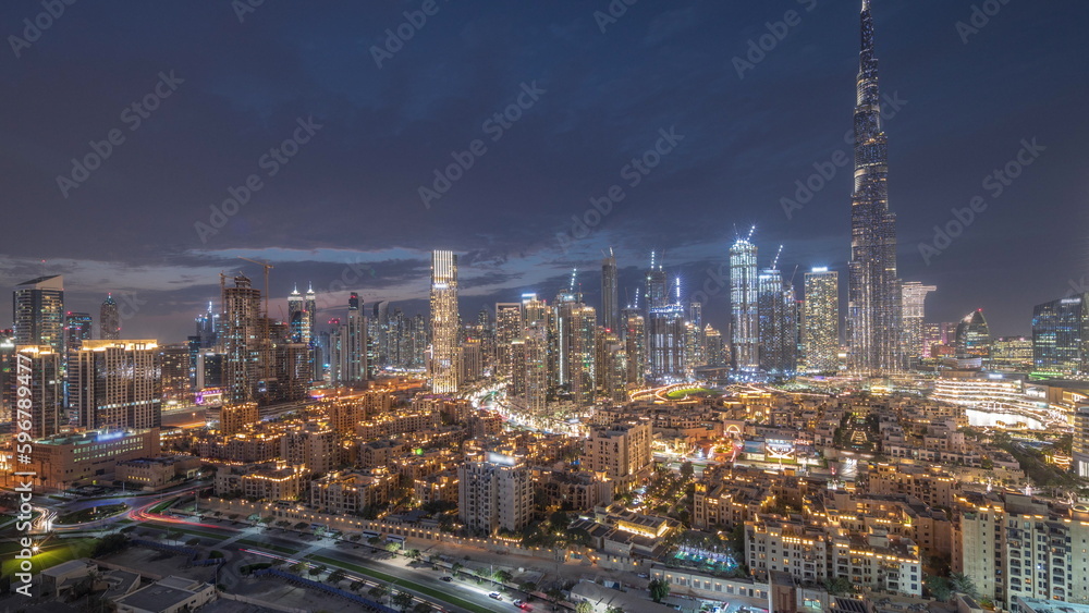 Dubai Downtown day to night transition timelapse with tallest skyscraper and other towers