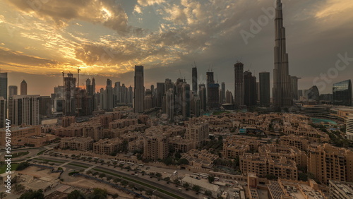 Sunset over Dubai Downtown timelapse with tallest skyscraper and other towers