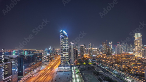 Dubai's business bay towers aerial night timelapse. Rooftop view of some skyscrapers © neiezhmakov