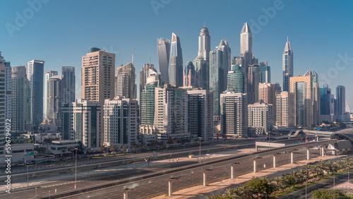 Dubai marina tallest block of skyscrapers all day timelapse.