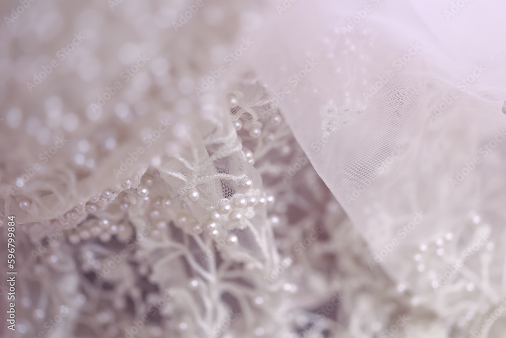 Wedding concept Close up of detail on wedding gown Wedding concept Close up of detail on wedding gown