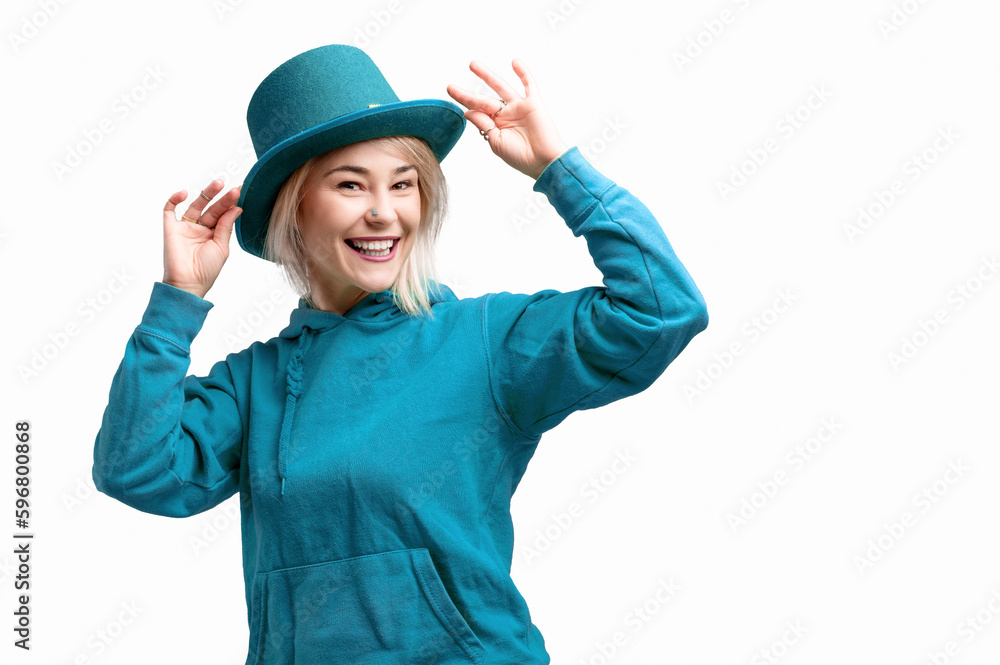 Smiling woman. Beautifu young woman wearing blue hat and in a blue sweatshirt.
