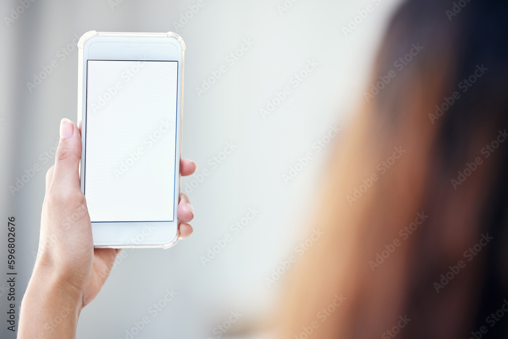 Anything you do on the internet leaves a trail behind you. Closeup shot of an unrecognisable woman holding a cellphone with a blank screen.