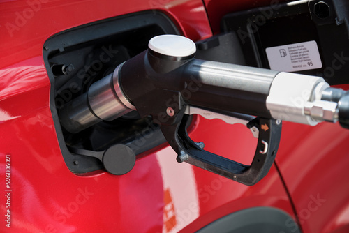 Compressed Natural Gas (GNC) pump fueling a car