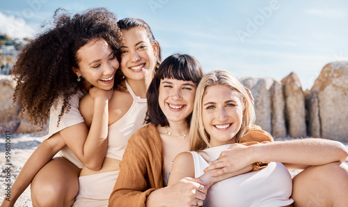 Sunny smiles and happy hearts. Shot of a group of female friends spending time together at the beach.