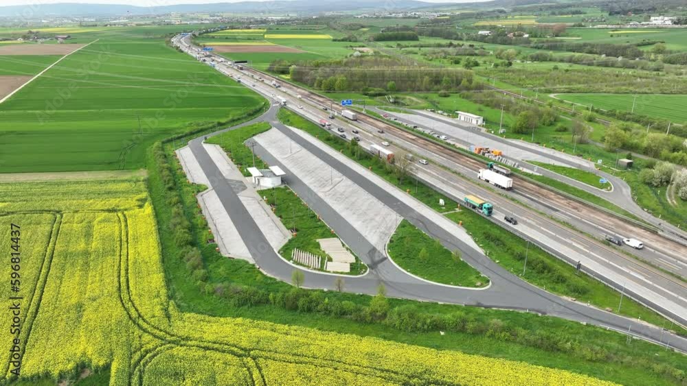 Traffic on a highway - rest area, aerial view, tracking shot Traffic on a highway - rest area, aerial view, tracking shot