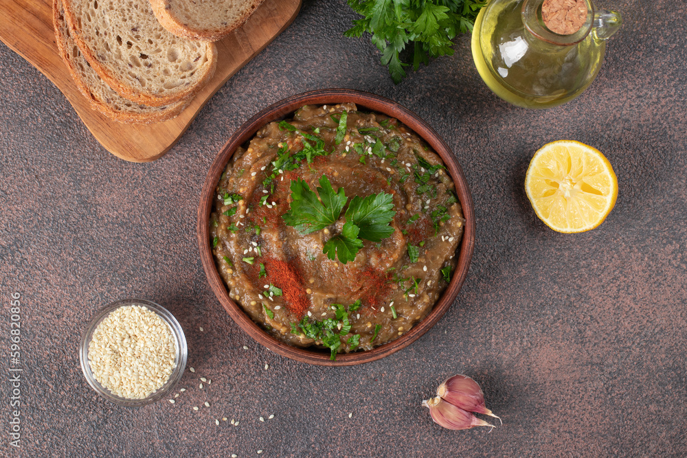 Baba ganoush Levantine cuisine appetizer from baked eggplant with parsley, garlic and olive oil Baba ganoush Levantine cuisine appetizer from baked eggplant with parsley, garlic and olive oil