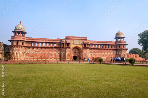 The famous red fort in the city of Agra, India. Tourists visit a popular tourist attraction. photo