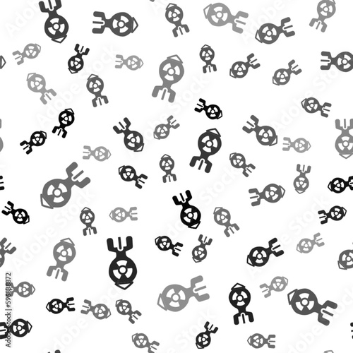 Black Nuclear bomb icon isolated seamless pattern on white background. Rocket bomb flies down. Vector