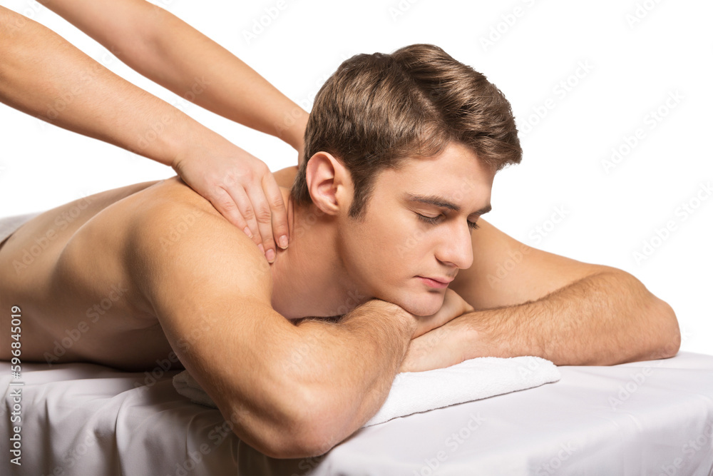 Man on a massage table is massaged by female hands Man on a massage table is massaged by female hands